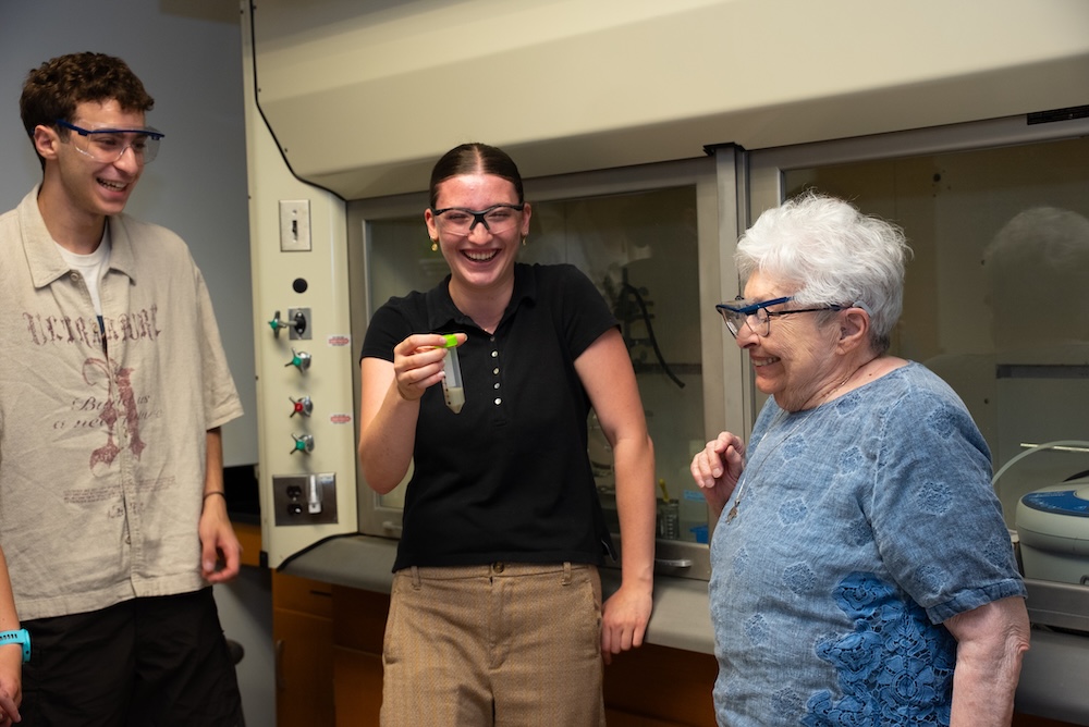 student and woman in lab