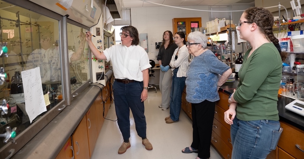 Yvonne Martin, professor and students in lab