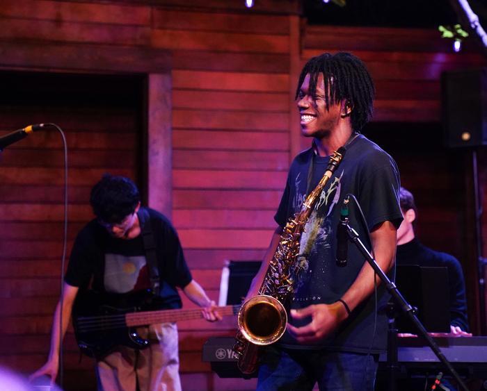 student playing music