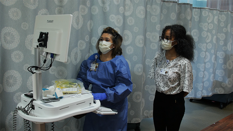a student observing a nurse on duty