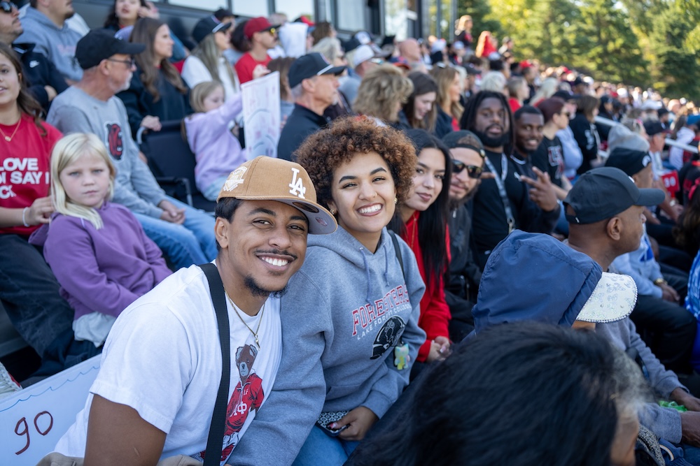 alumni at football game