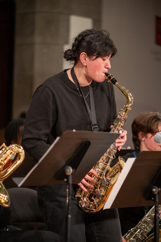 student playing the saxophone in jazz band