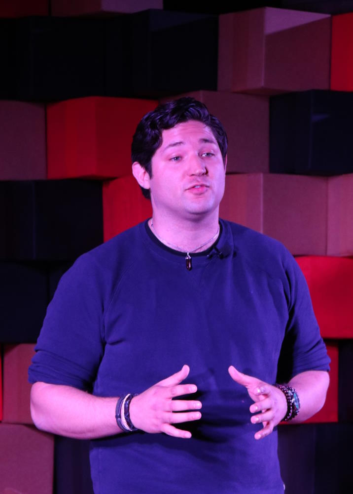 student presenting their ideas before an audience