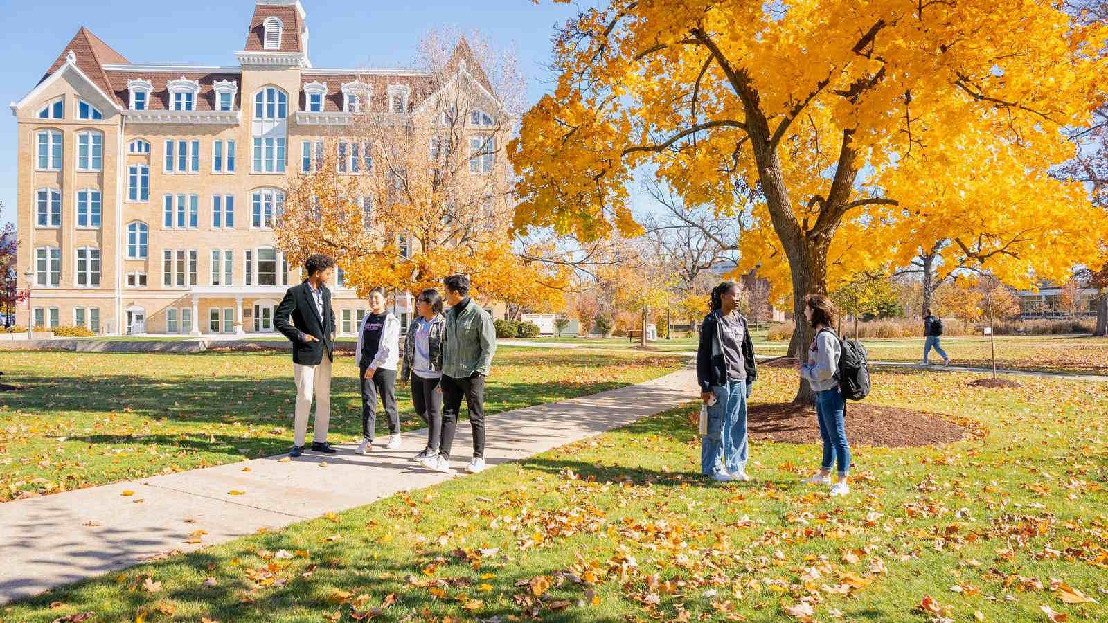 students in front of brown hall