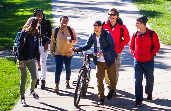 students walking on campus pathways