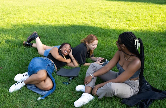 students hanging out on the middle campus quad
