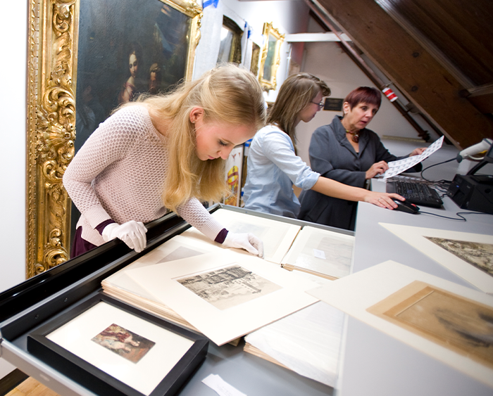 professor and student with book