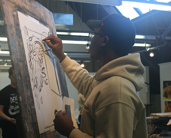 girl looking at artwork