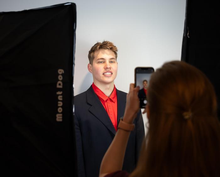 student getting headshot