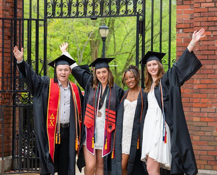 students in graduation robes and hats