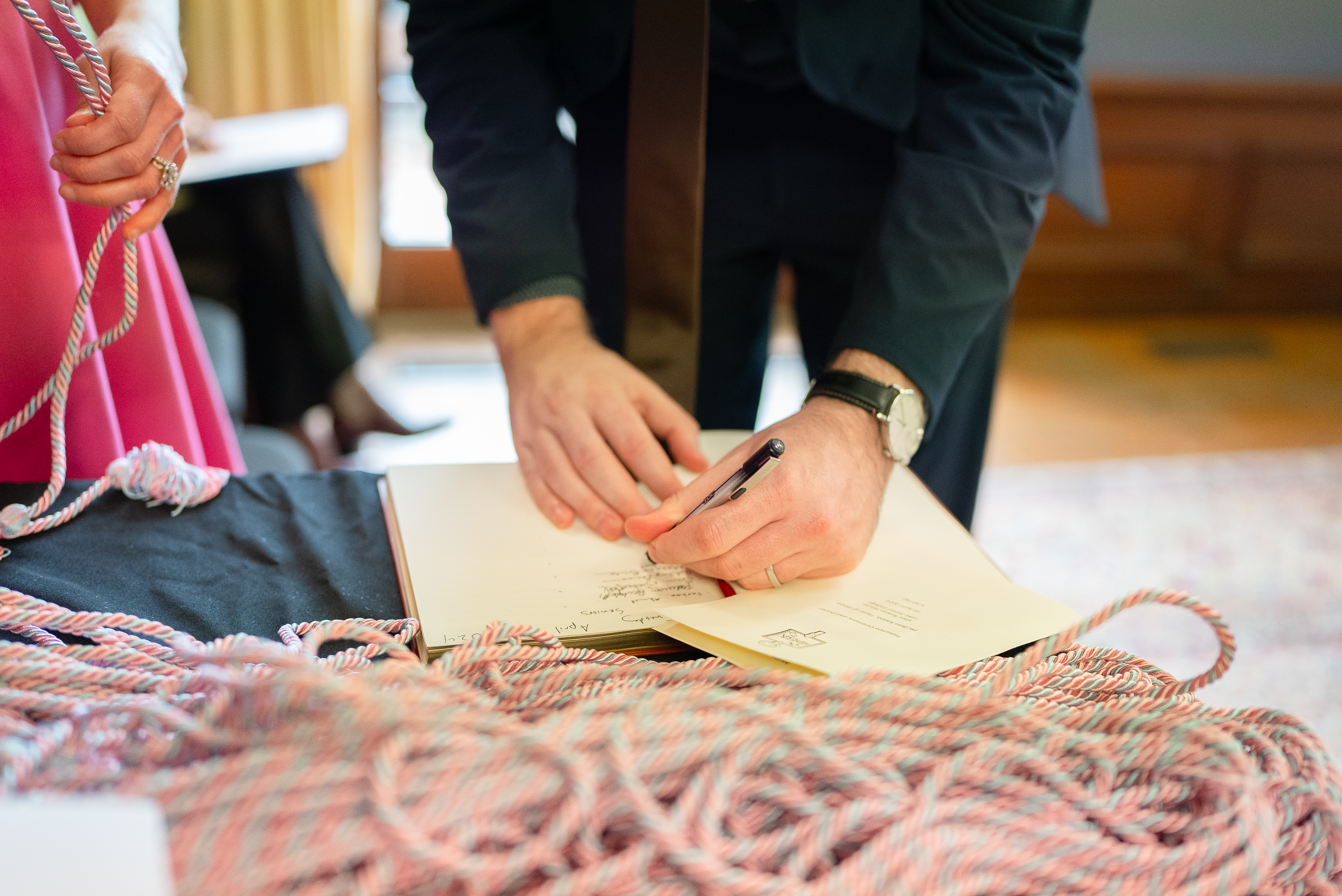 Phi Beta Kappa ribbon pile and hands