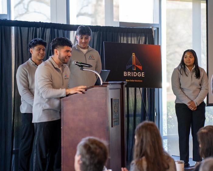 students at the competition presenting