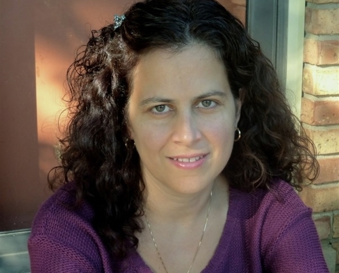 headshot of Gizella Meneses