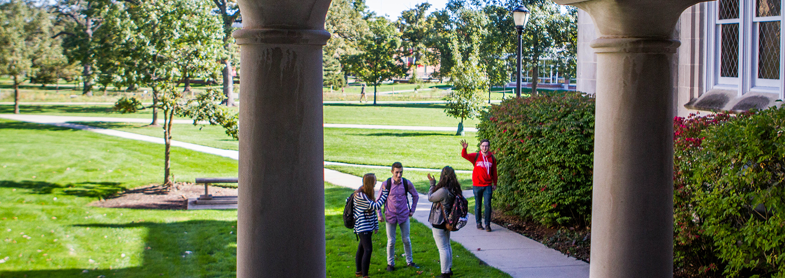 students talking outside