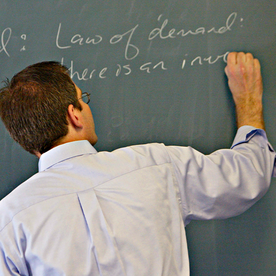 A Lake Forest College economics professor teaching