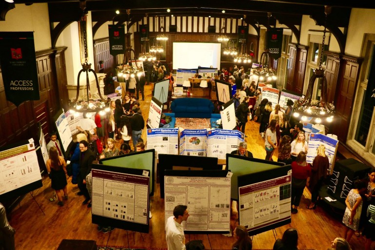 The Glassman Symposium Poster Session seen from a balcony above