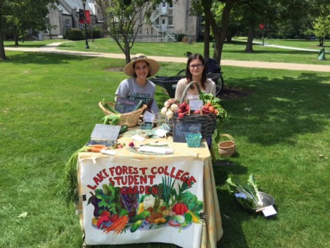 Isabelle Carrot '19 (left) and Olga Gutan '19 (right) sell produce at the Middle Campus Market